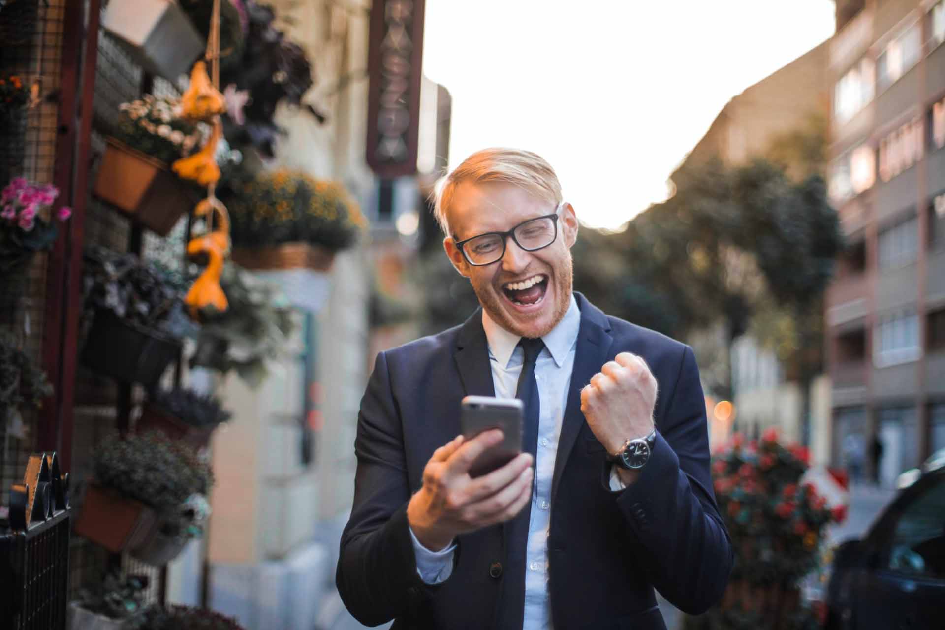 man-in-black-suit-jacket-received-a-good-news man in black suit jacket received a good news